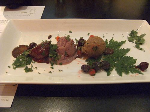 berry dessert with chicory leaf