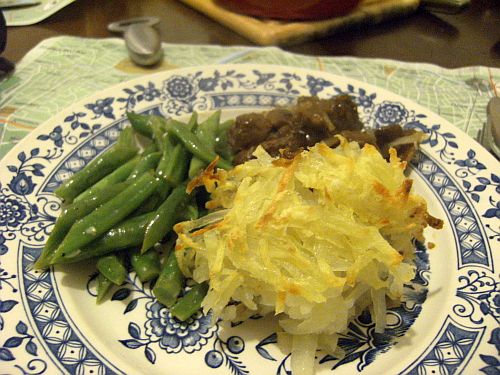 pie on plate with beans